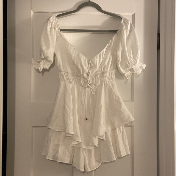 New with tags! Has a super subtle cheetah print (white on white). - Picture 1 of 3